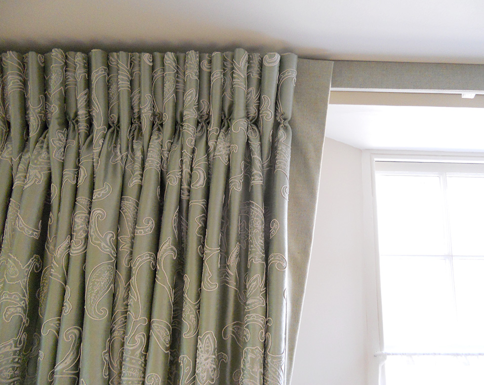 Curtains with goblet pleats on track with covered fascia